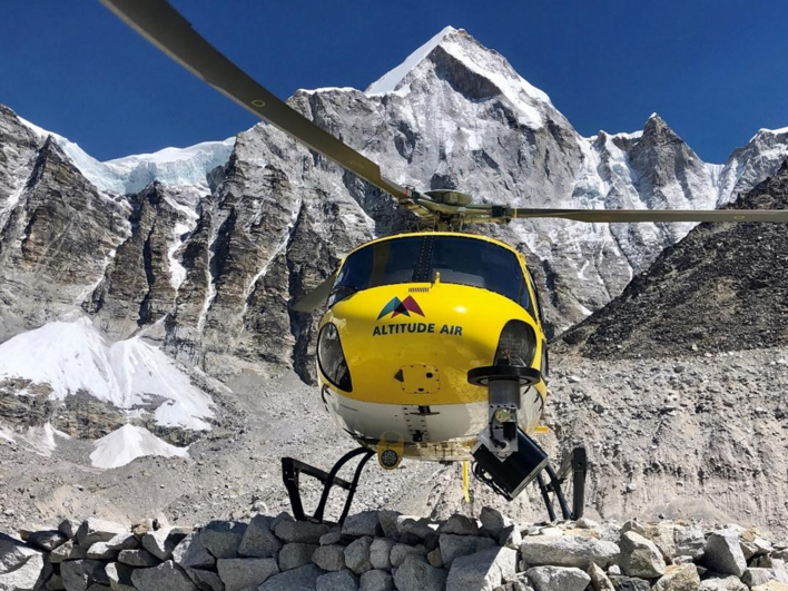 The sidescan <em>RIEGL</em> lidar sensor is mounted on the front of the Eurocopter AS350B3e helicopter used for acquisition. Mount Everest provides a gorgeous backdrop for this acquisition.