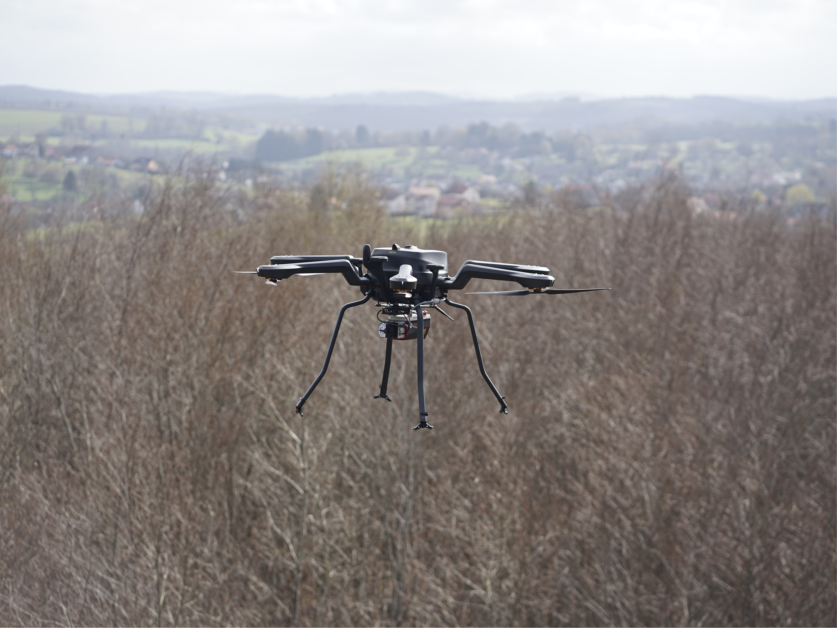 <em>RIEGL</em> VUX-120 mounted on the Acecore NOA UAV during LiDAR data acquisition at the ICOS Station Hesse near Strasbourg, capturing high-density 3D data over challenging terrain (picture by courtesy of Johannes Wilk).